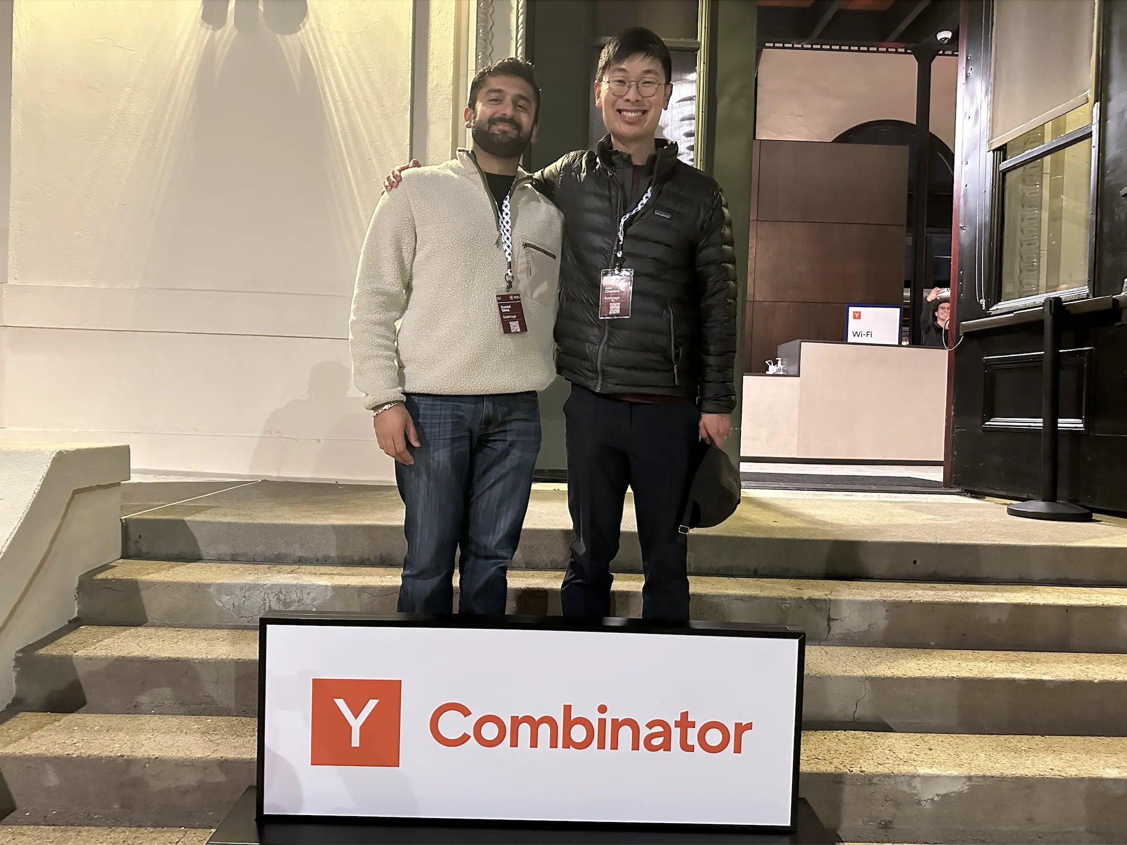 Kunaal Sikka and Alex Chantavy in front of the YC sign